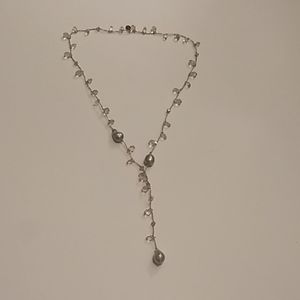 Pale pink gems with raw pearl accents